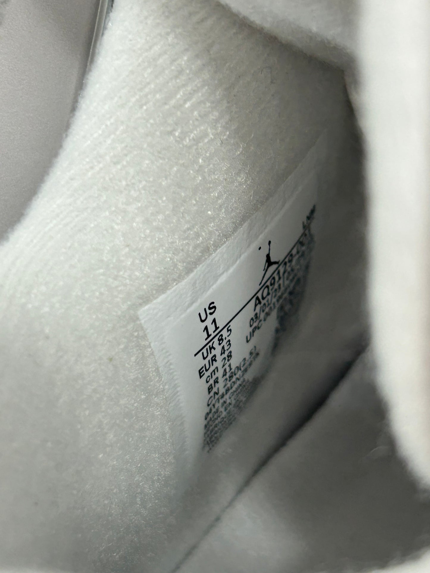 Jordan 4 Frozen Moments