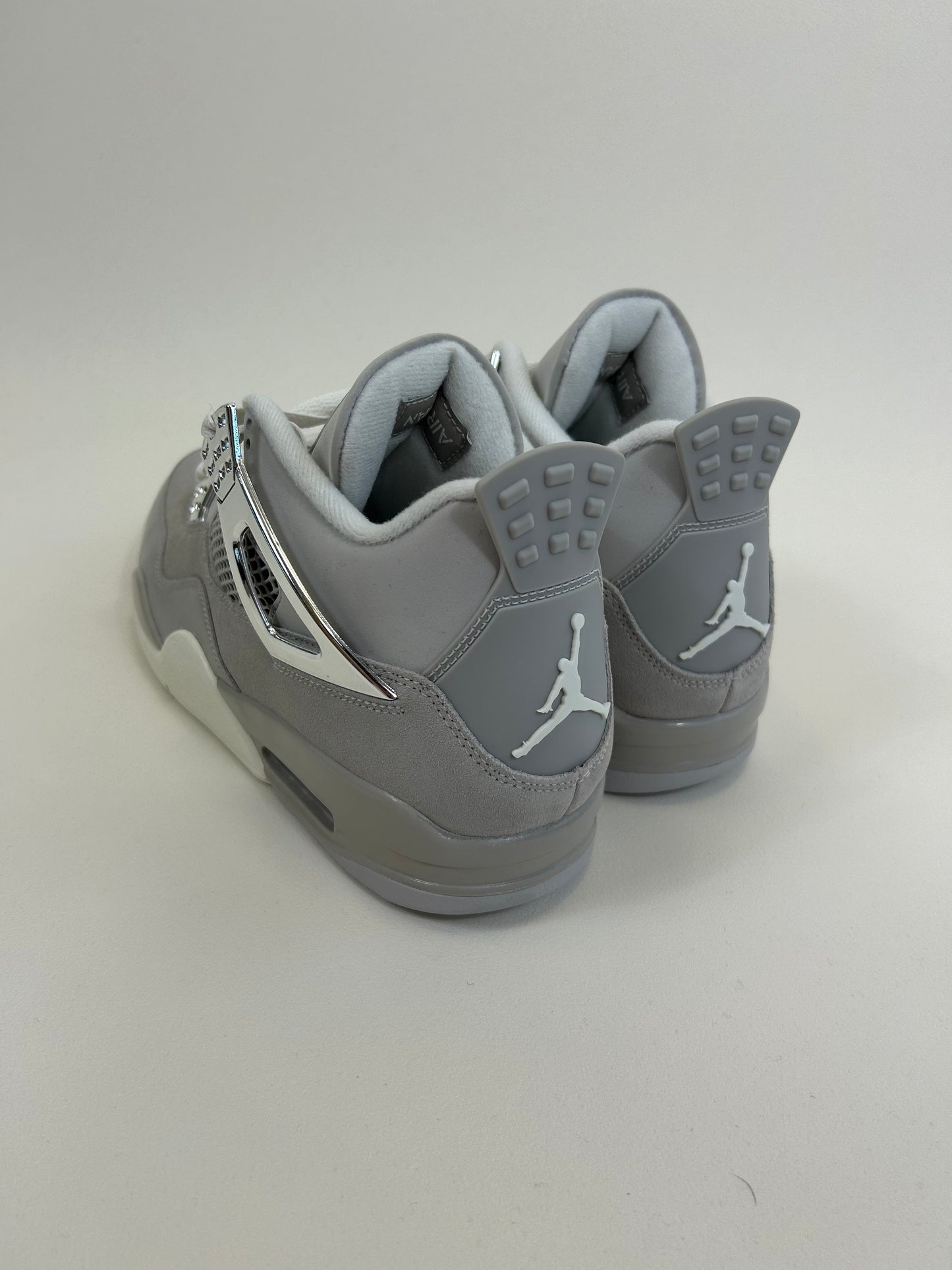 Jordan 4 Frozen Moments